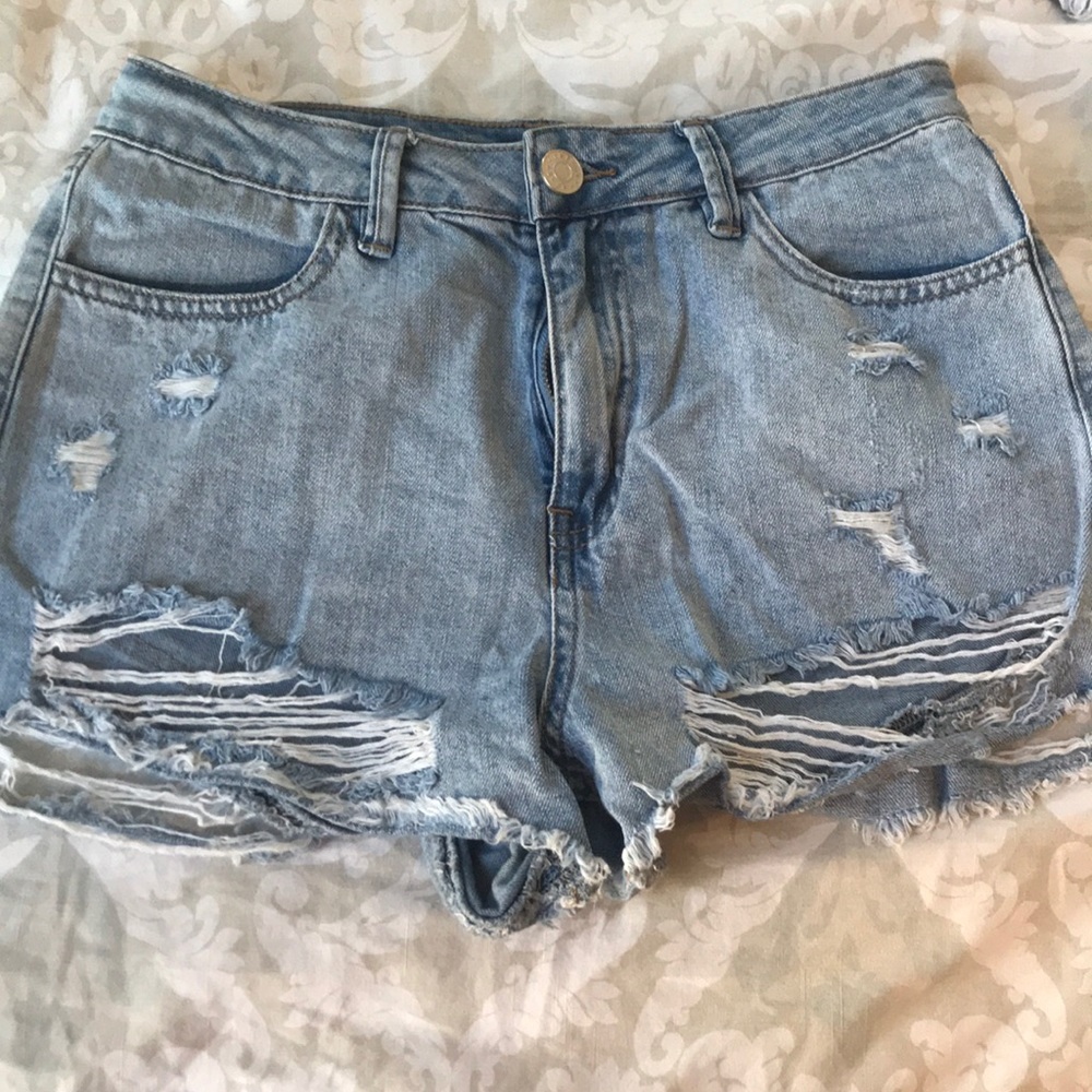 Medium wash distressed jean shorts